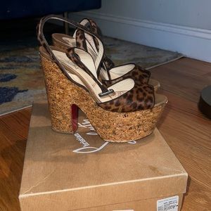 Leopard print wedge stewpot sandal.